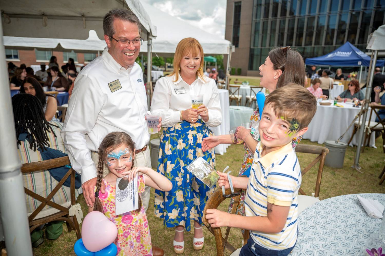 President Keen socializing with alumni at event