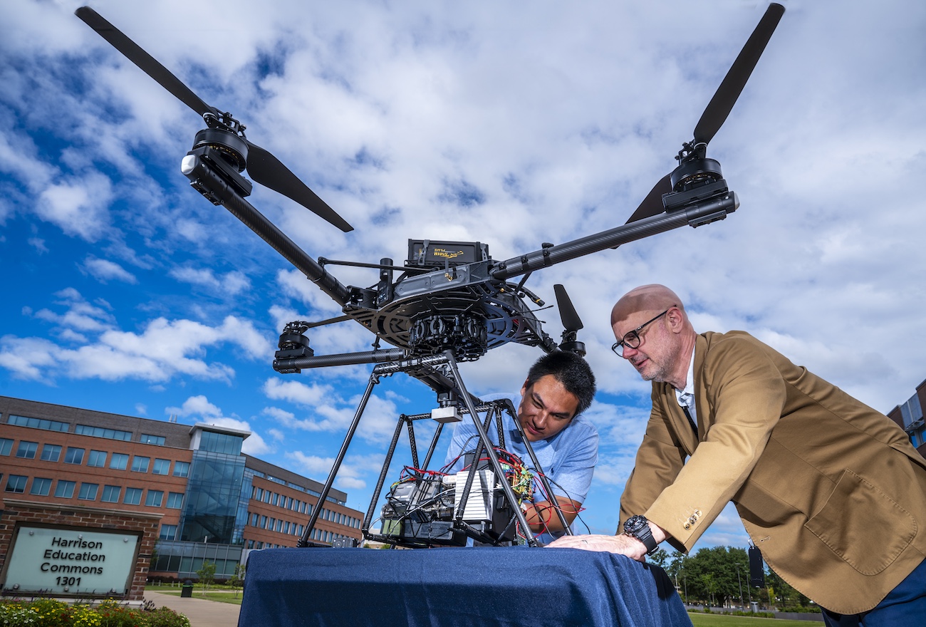 Two people with the drone