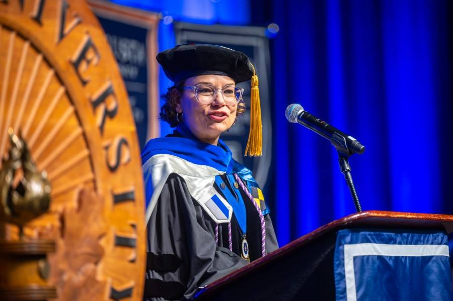 woman speaking at podium