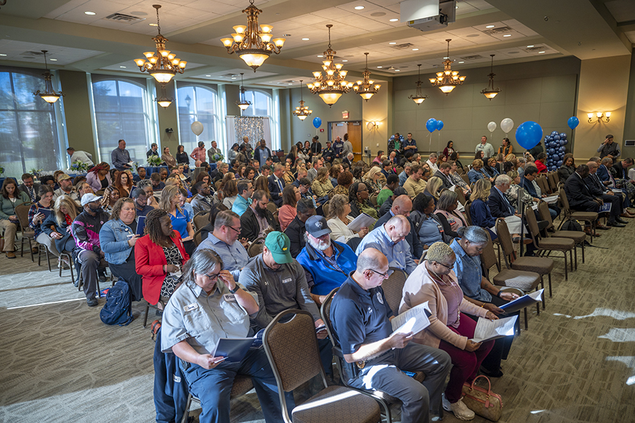 Employees at recognition ceremony in ballroom