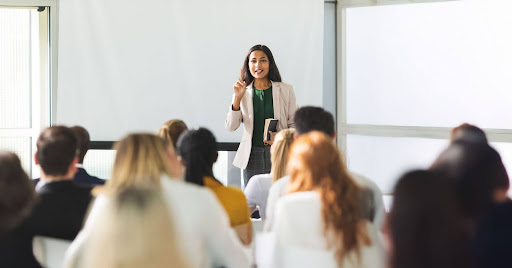 Teacher in classroom interacting with her students